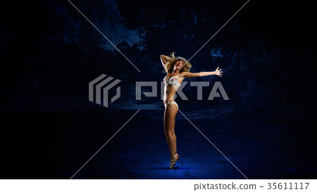 Dancing blonde in bikini Dancing blonde in bikini 35611117