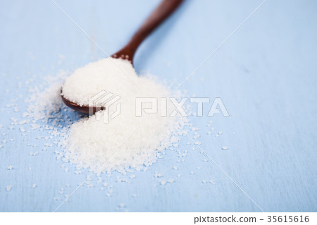 Wooden spoon with sugar 35615616