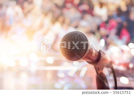 Microphone in concert stage and people background Microphone in concert stage and people background 35615751