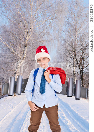 Young Santa Claus with a jetpack on his back Young Santa Claus with a jetpack on his back 35618376