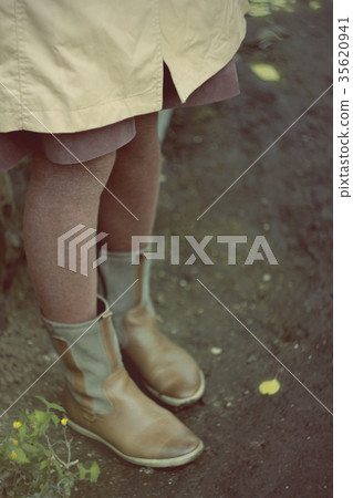 Female legs in boots, brown tights. Autumn mood Female legs in boots, brown tights. Autumn mood 35620941