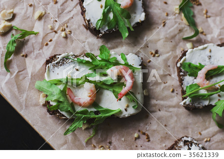 sandwiches on grain bread with ricotta and shrimp 35621339