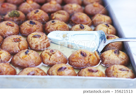Oriental turkish sweets, baklava on the metal old Oriental turkish sweets, baklava on the metal old 35621513