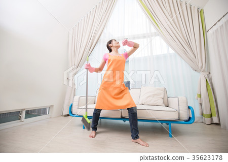 woman in living room woman in living room 35623178