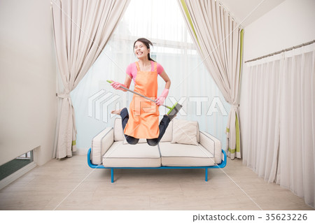 woman in living room woman in living room 35623226