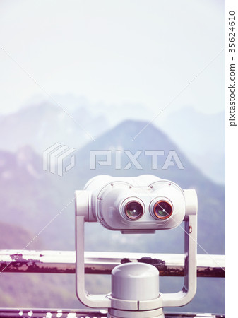 Vintage toned picture of tourist binoculars. Vintage toned picture of tourist binoculars. 35624610