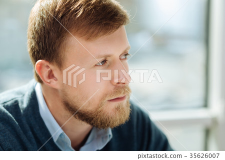 Attractive office worker being deep in thoughts Attractive office worker being deep in thoughts 35626007