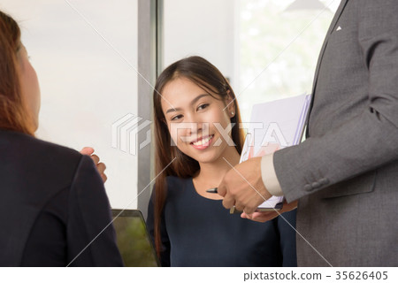 business woman looking at presentation in meeting 35626405