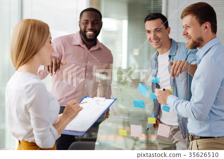 Attentive female person reading her list 35626510