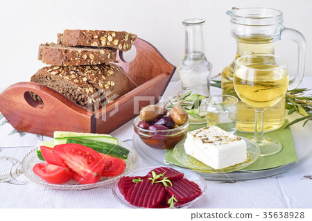 Greek food,. Jars with olive oil and wine vinegar Greek food,. Jars with olive oil and wine vinegar 35638928
