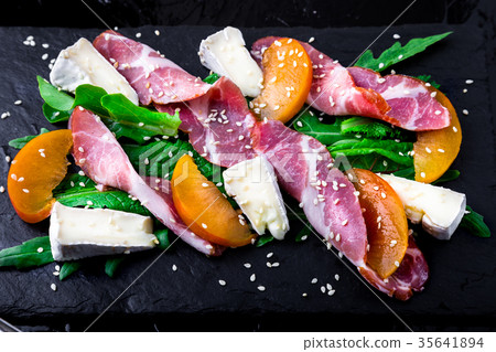 Salad with ham jamon serrano, camembert 35641894
