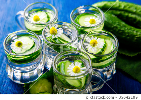 Cucumber water in six little mason glass jar Cucumber water in six little mason glass jar 35642199