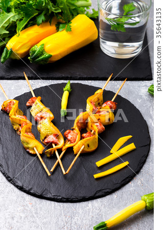 Zucchini and chicken kebab on wooden Zucchini and chicken kebab on wooden 35643135
