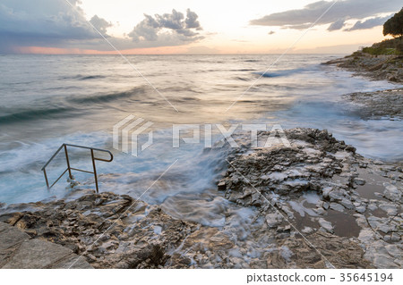 Stormy rocky beach sunset on the Adriatic Sea 35645194
