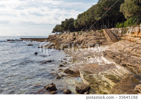 Sunset rocky beach in Istria, Croatia. 35645198