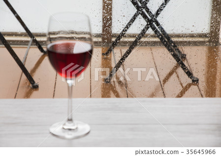Red wine on a rainy day Red wine on a rainy day 35645966