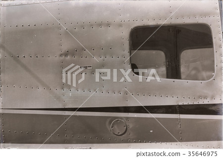 parking in the airport window of little popular   plane 35646975