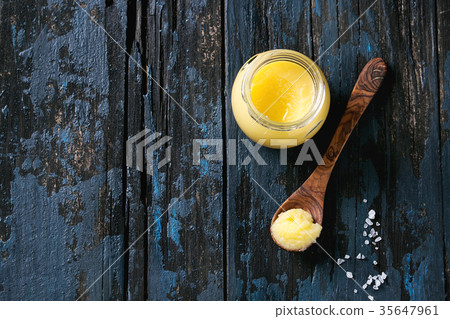 Glass of ghee butter 35647961