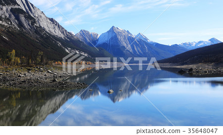Reflections tranquil lake view in Rocky Mountains Reflections tranquil lake view in Rocky Mountains 35648047