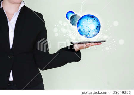 the girl is holding a tablet tablet. concept 35649295
