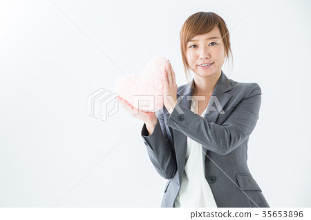 Business woman with heart 35653896