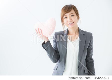 Business woman with heart 35653897