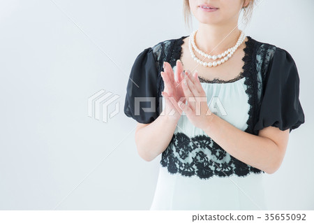 Woman in dress thinking Woman in dress thinking 35655092