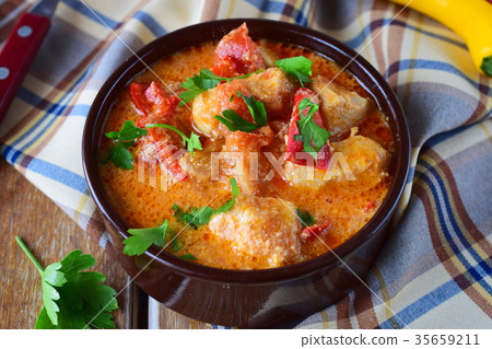 Hungarian dish with paprika and chicken, sauce 35659211