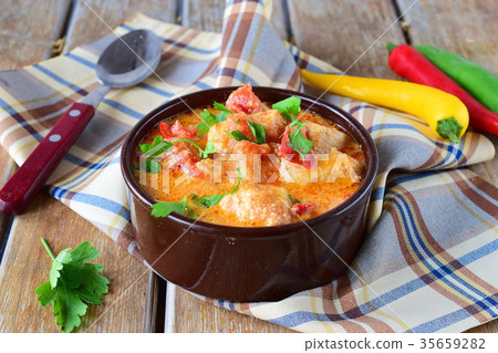 Hungarian dish with paprika and chicken, sauce 35659282
