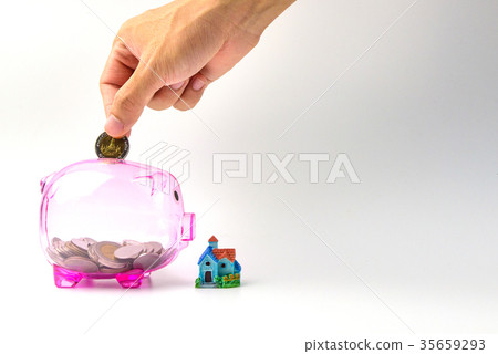 Hand drop coins on Clear pink Piggy bank Hand drop coins on Clear pink Piggy bank 35659293