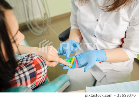 Female dentist working at dental clinic with female patien Female dentist working at dental clinic with female patien 35659370