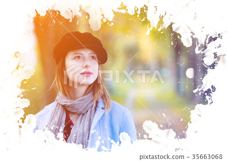 woman in blue coat have a rest in autum park 35663068