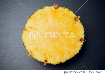 isolated on a black background, fresh pineapple isolated on a black background, fresh pineapple 35663625
