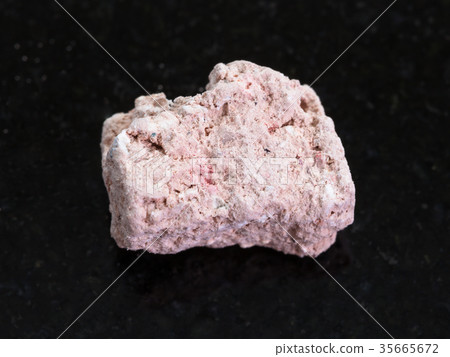 raw Kaolinite stone on dark background raw Kaolinite stone on dark background 35665672