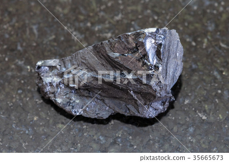rough Anthracite coal on dark background rough Anthracite coal on dark background 35665673