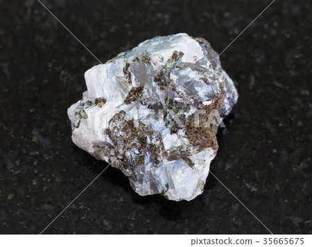 raw sphalerite (zinc blende) stone on dark raw sphalerite (zinc blende) stone on dark 35665675