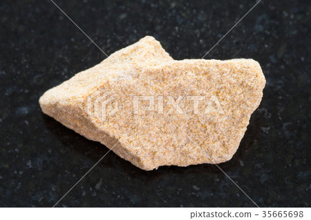 raw sandstone stone on dark background 35665698