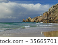 Lighthouse on rocky coast, Atlatic Ocean, France 35665701