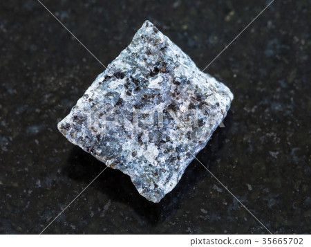 rough Gabbro stone on dark background 35665702