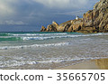 Lighthouse on rocky coast, Atlatic Ocean, France 35665705