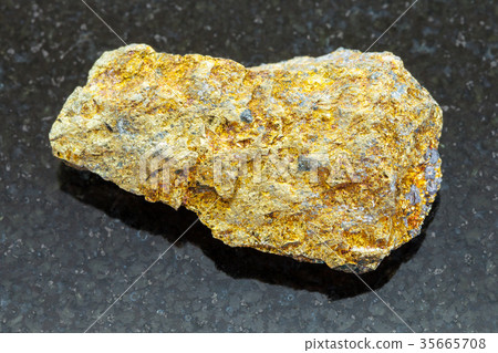 raw pyrite ore on dark background raw pyrite ore on dark background 35665708