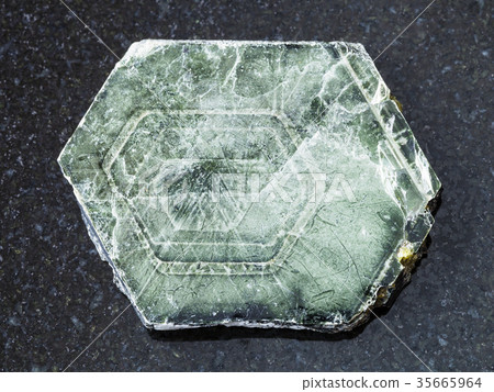 raw Phlogopite stone on dark background 35665964