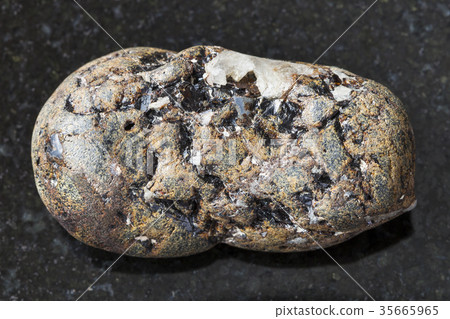 tumbled sphalerite stone with Galena on dark 35665965