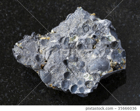 pisolite stone from magnetite and hematite on dark 35666036