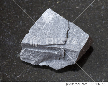 rough argillite stone on dark background 35666153
