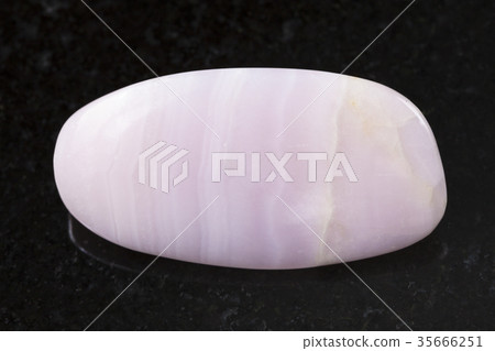 tumbled manganocalcite gemstone on dark tumbled manganocalcite gemstone on dark 35666251