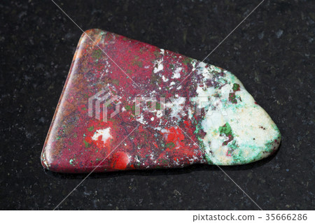 tumbled red Cuprite and green Chrysocolla on dark tumbled red Cuprite and green Chrysocolla on dark 35666286