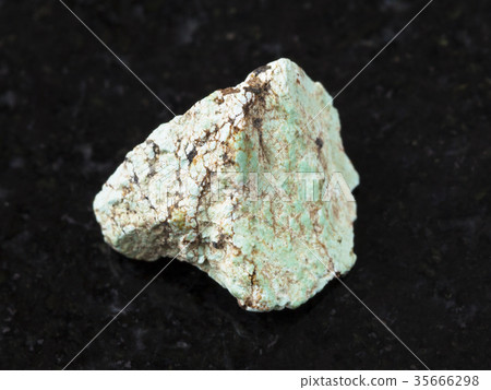 rough green Turquoise gemstone on dark rough green Turquoise gemstone on dark 35666298
