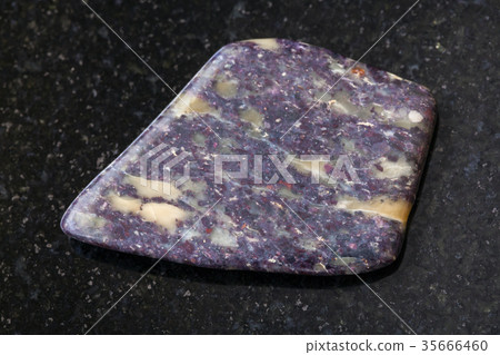 tumbled Alunite stone on dark background tumbled Alunite stone on dark background 35666460