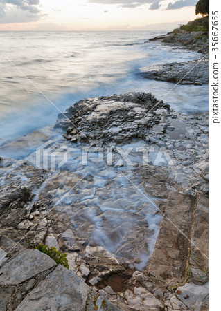 Stormy rocky beach sunset on Adriatic Sea 35667655